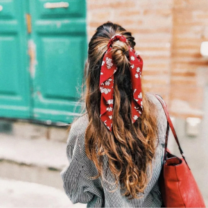 Try this chic half-bun hairstyle with hair extensions