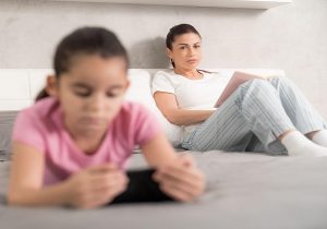kid using electronic device
